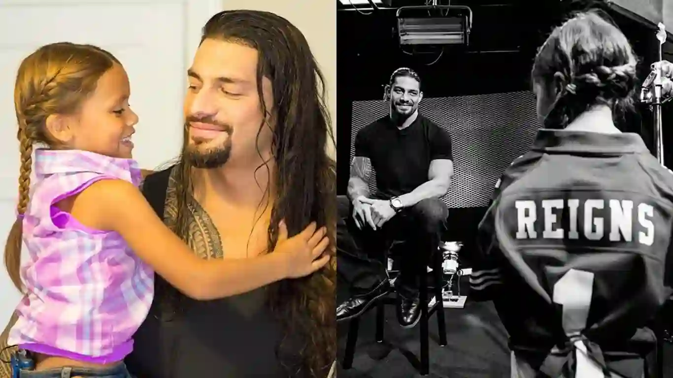 Roman Reigns having her daughter in his arms
